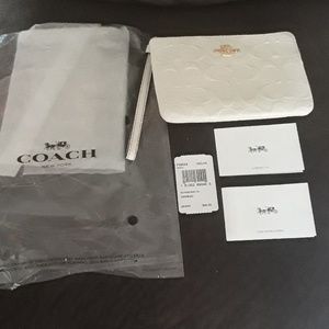 NEW Signature Coach Embossed Wristlet Wallet White